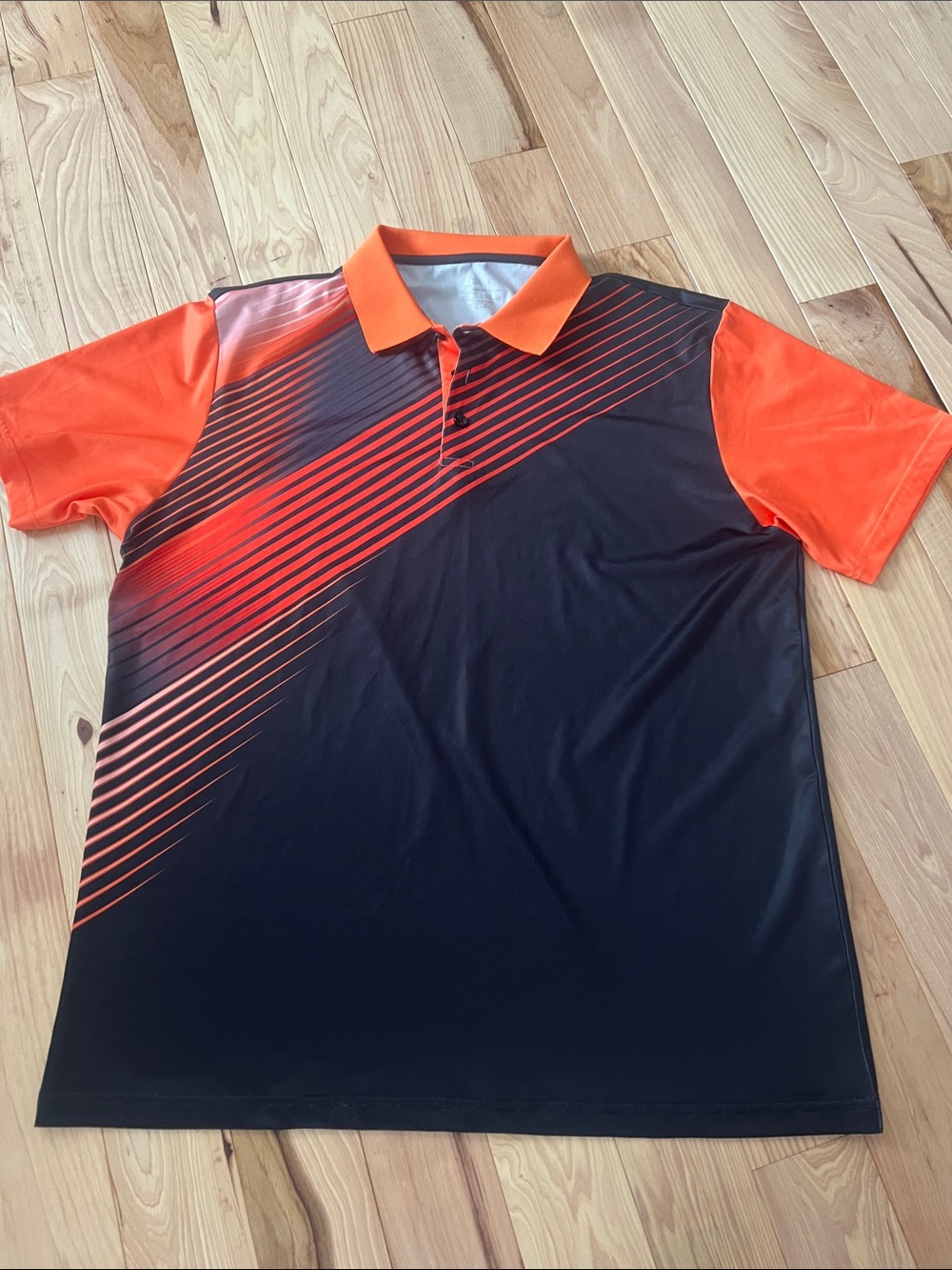 NWOT Black and Orange Diagonal-Stripe Polo